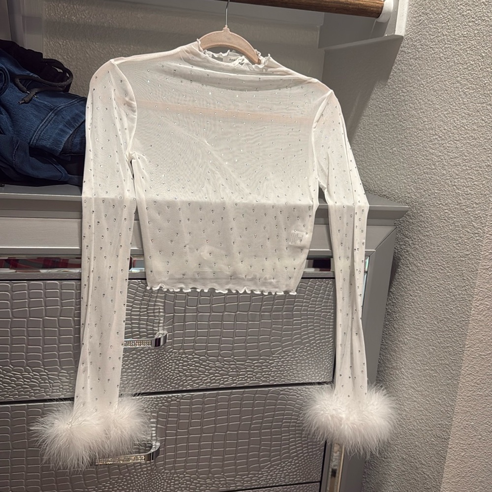 White sparkling blouse